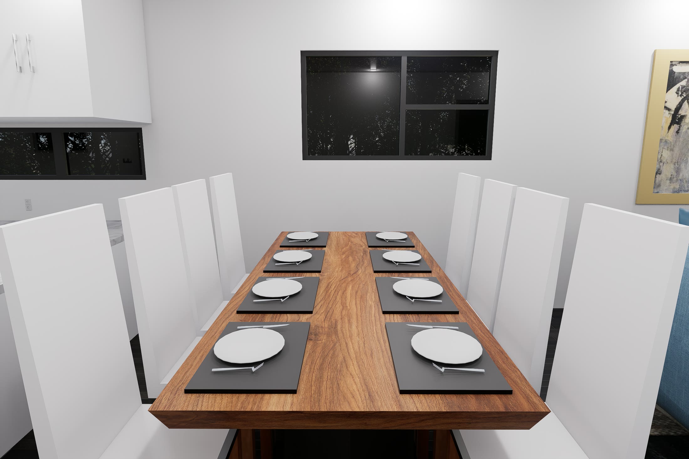 The dining table laid for eight, a solid timber top between white chairs