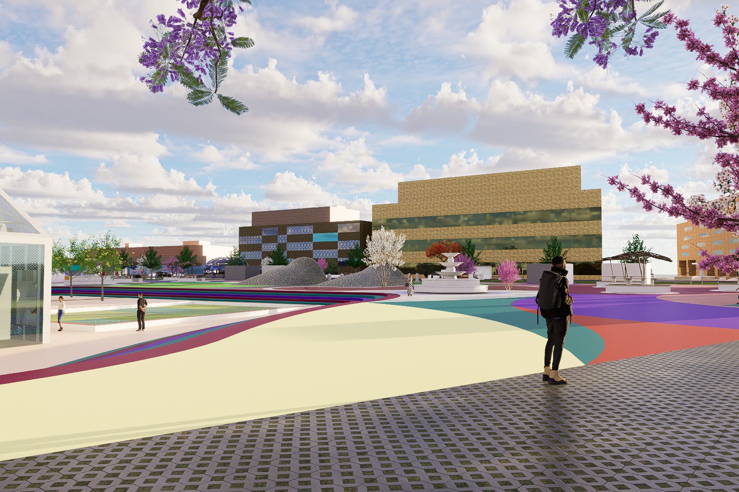 Tri-Spectra from the side with the coloured ground pattern sweeping across it and the district buildings behind