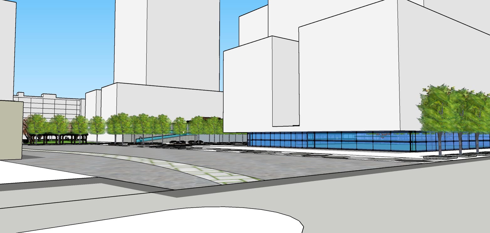 Eye level view across an open plaza with the massing blocks around it and the water strip beyond